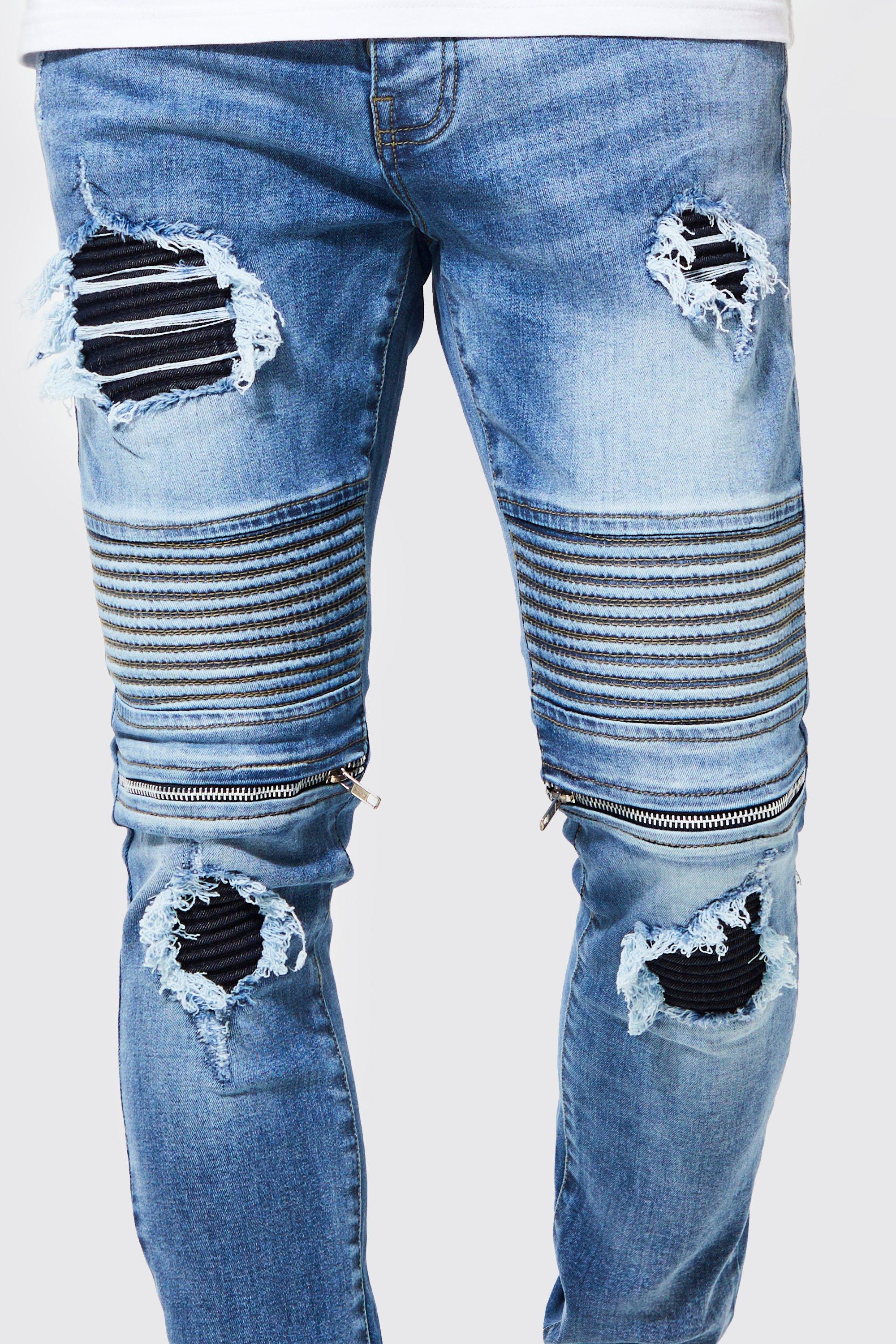 Ripped biker store jeans with zippers